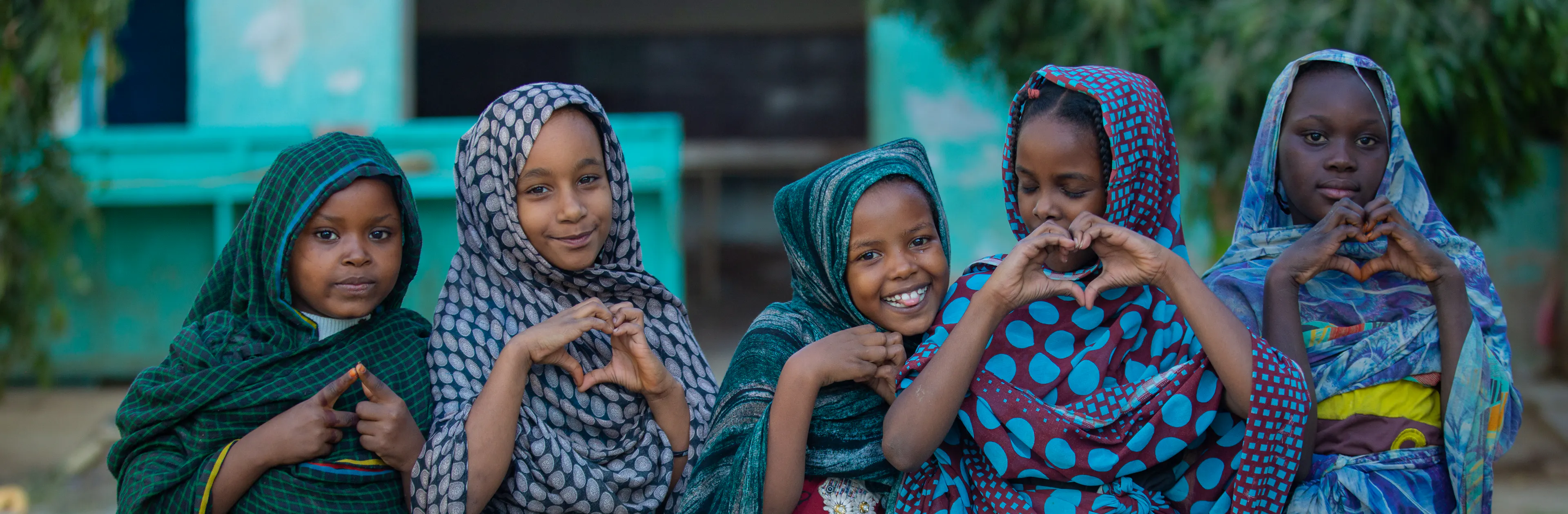 School girls in Sudan smile for the camera