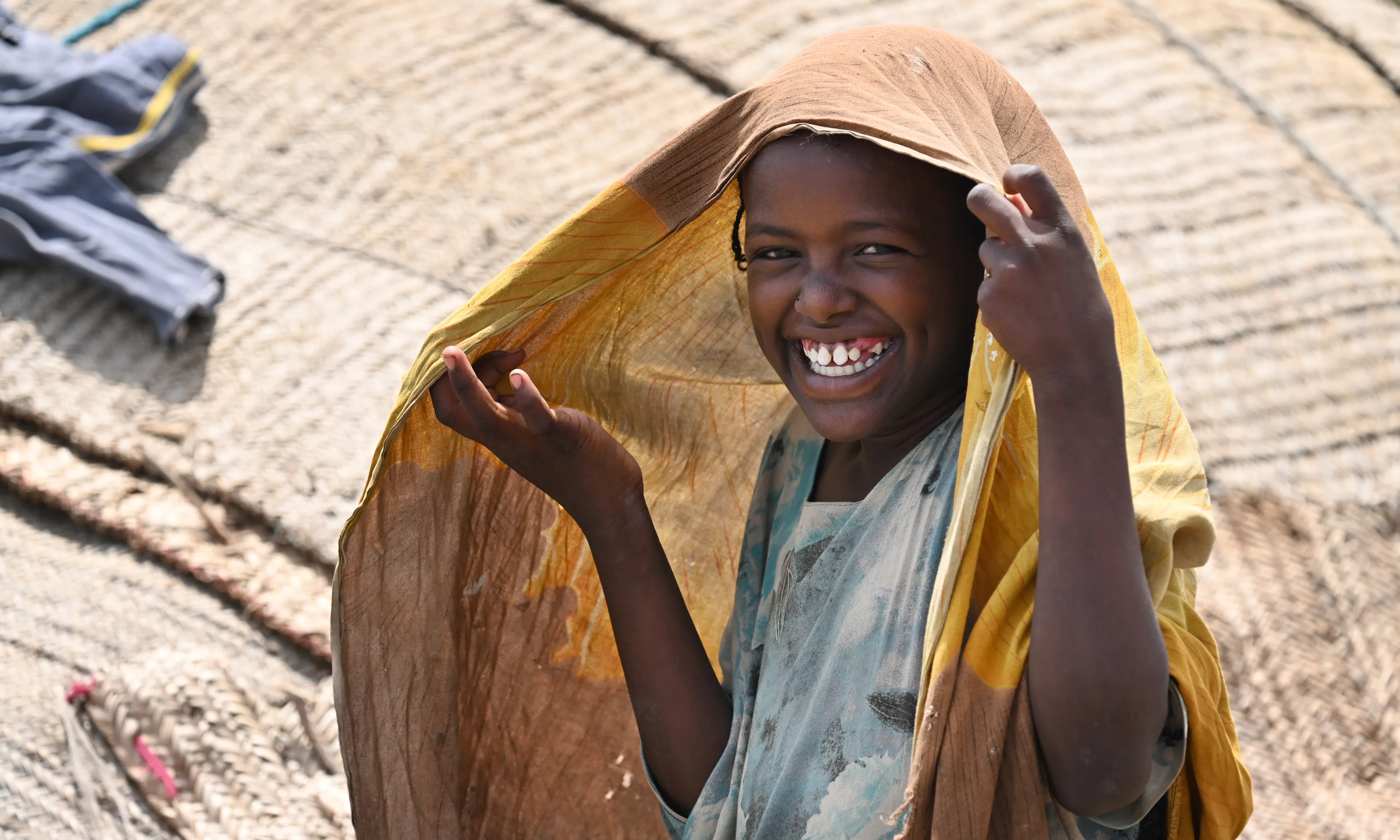 A child in Daba, in northeastern Ethiopia, laughing. 