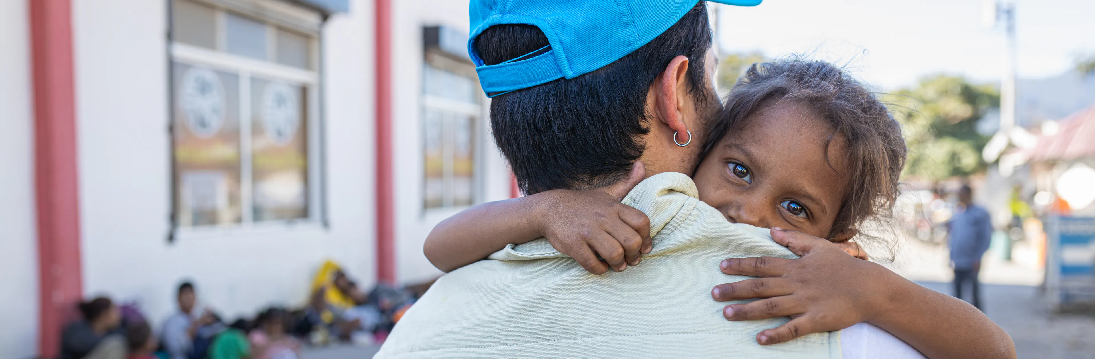  On February 26th 2024, Mario Gamarro, UNICEF Communications Consultant hugs Nicole (8-year-old) after being checked by mobile unit supported by UNICEF that provides aid to migrant children in Esquipulas, Guatemala.