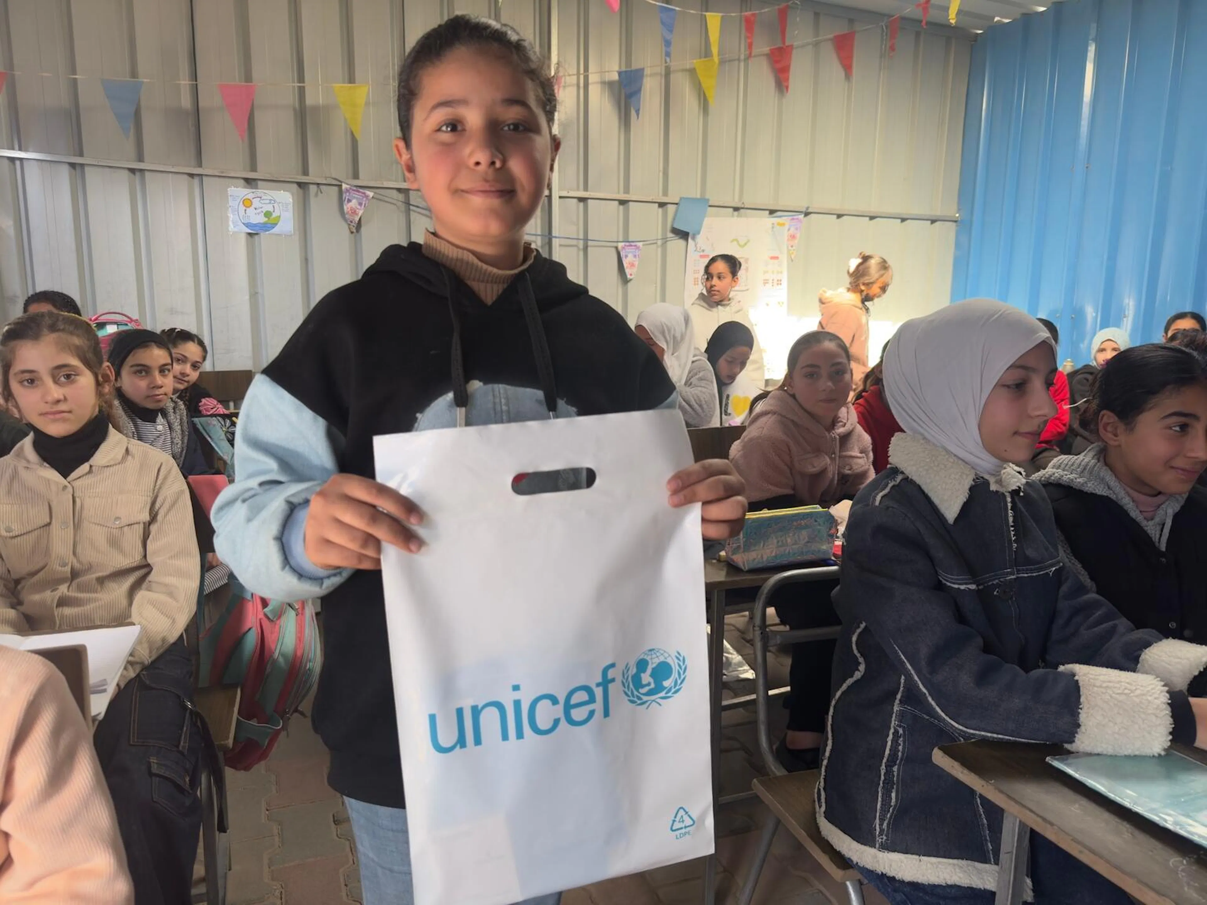 After months of waiting, UNICEF is distributing School-in-a-Box supplies to children in Deir El Balah, Gaza — helping them return to learning, rebuild routines, and find a sense of normality.