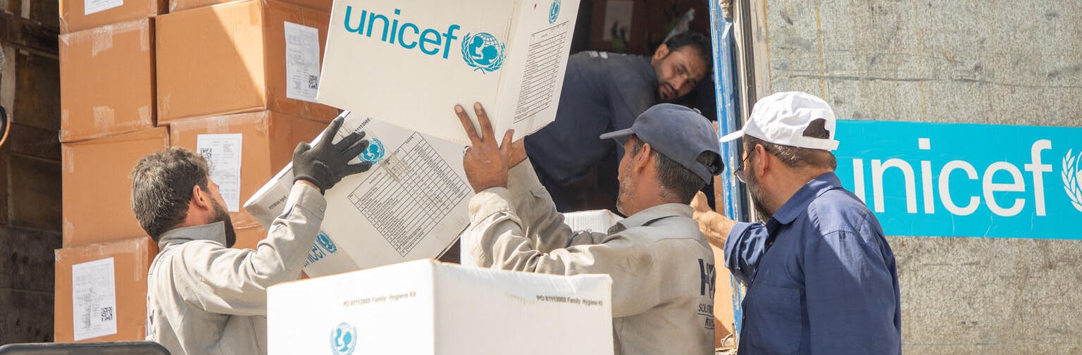 more than 80 tonnes of humanitarian supplies being offloaded in Kabul following several recent earthquakes