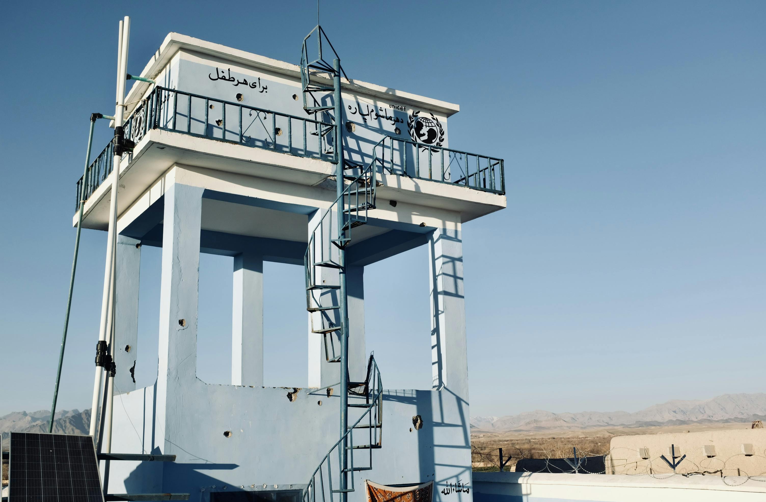 Emergency- The UNICEF water tower overseeing Tarinkot District in Sola Village.