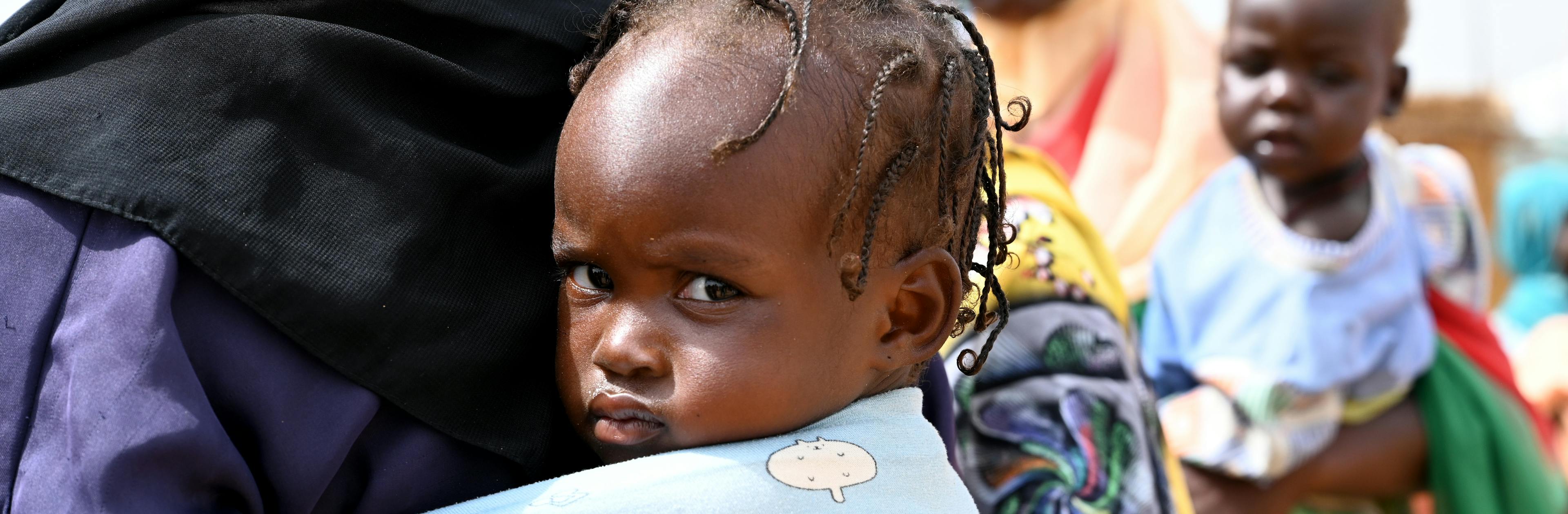 Mothers and children at the refugee site of Adré, in the East of Chad, close to the border of Sudan.
