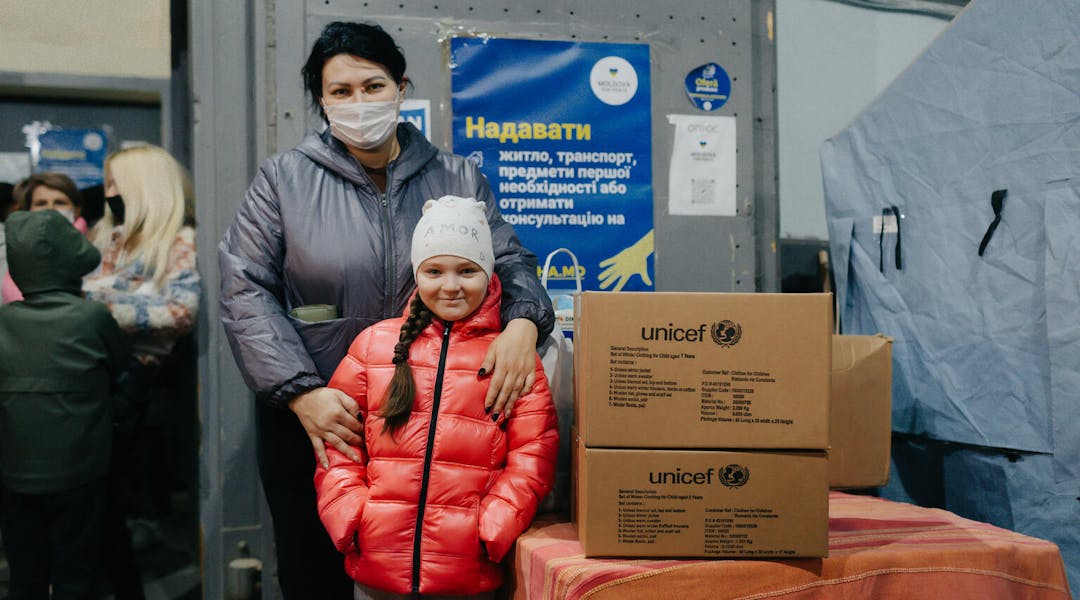 Ukraine Emergency, Varvara (7) has received a clothing kit from UNICEF in Chernihiv, Ukraine.