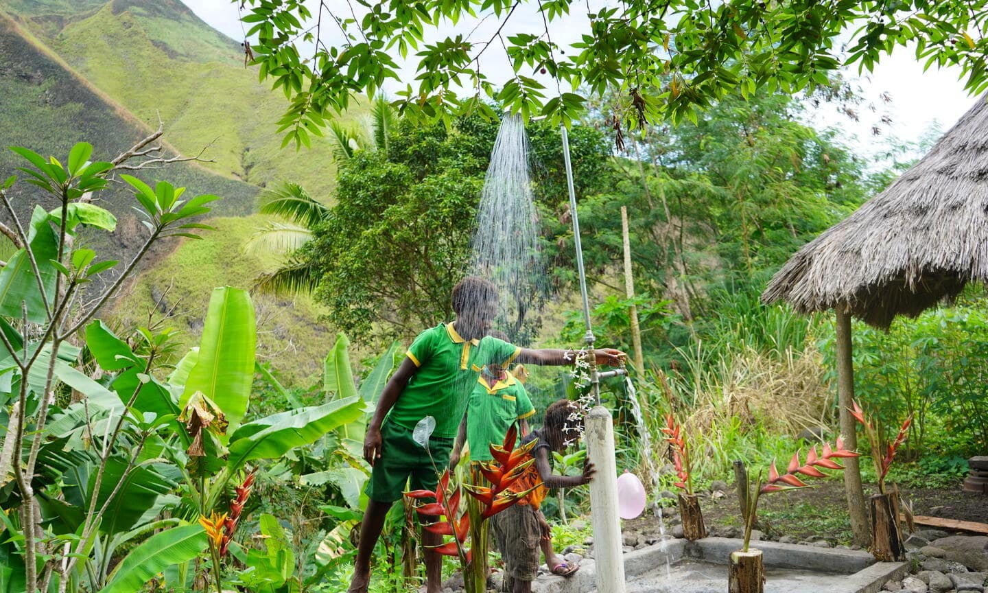 The installation of water point such as these (shower and tap), supported by the European Union and implemented by ADRA, means that school children at Kasuka community in Nawaeb District, Morobe Province no longer have to go far for their water needs.