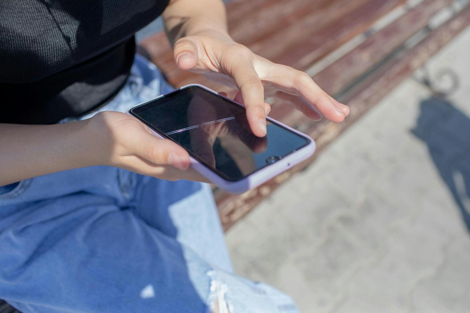 Child holding a mobile phone