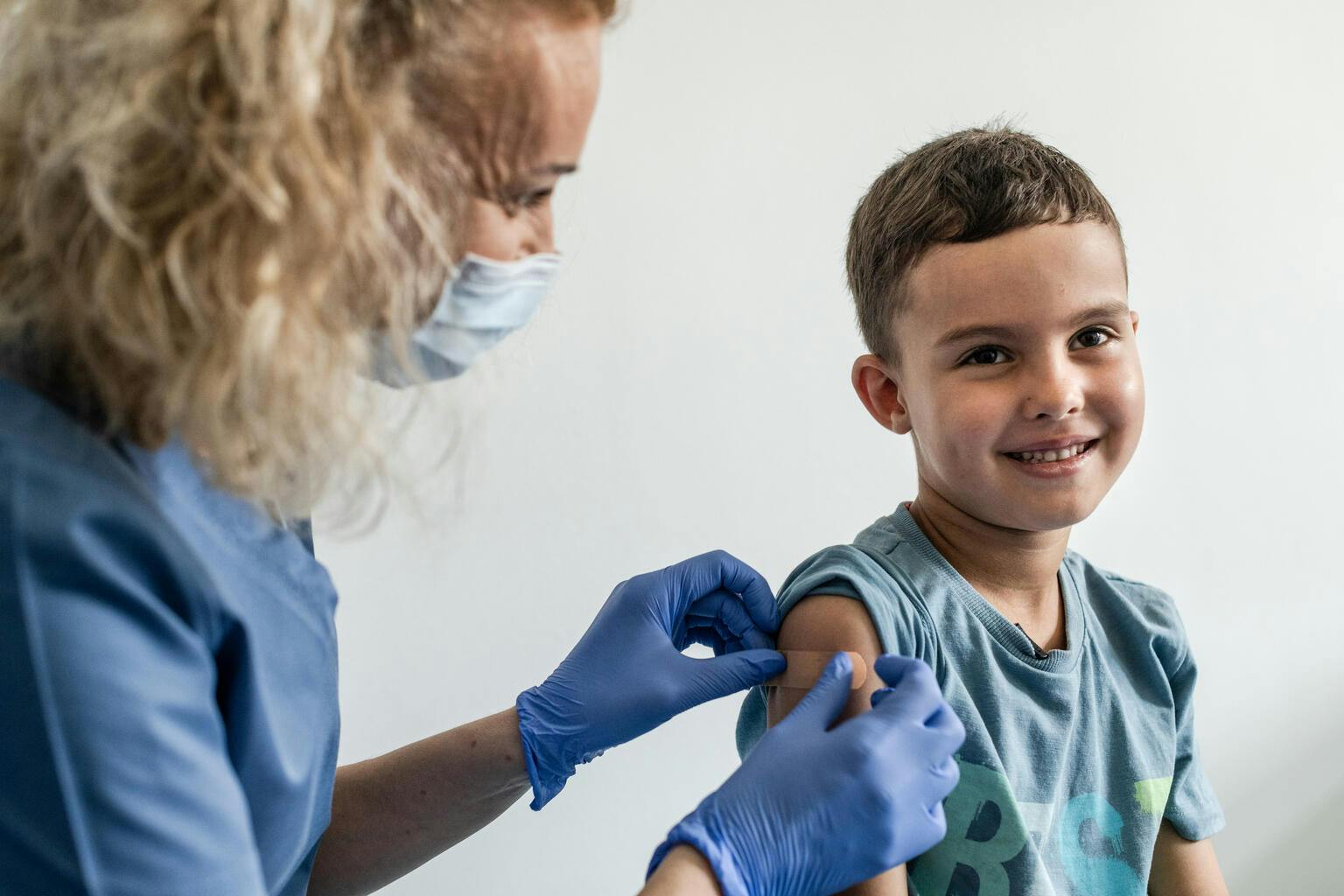 Immunisation - Six-year-old Mykyta receives his immunizations in Poland.