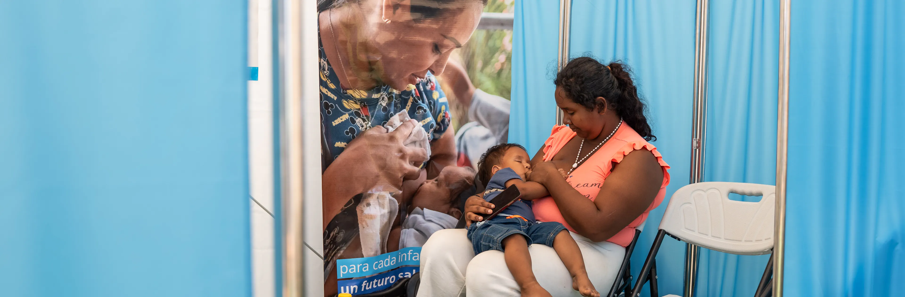 Luislyannys and her baby in a UNICEF transitional camp in Venezuela