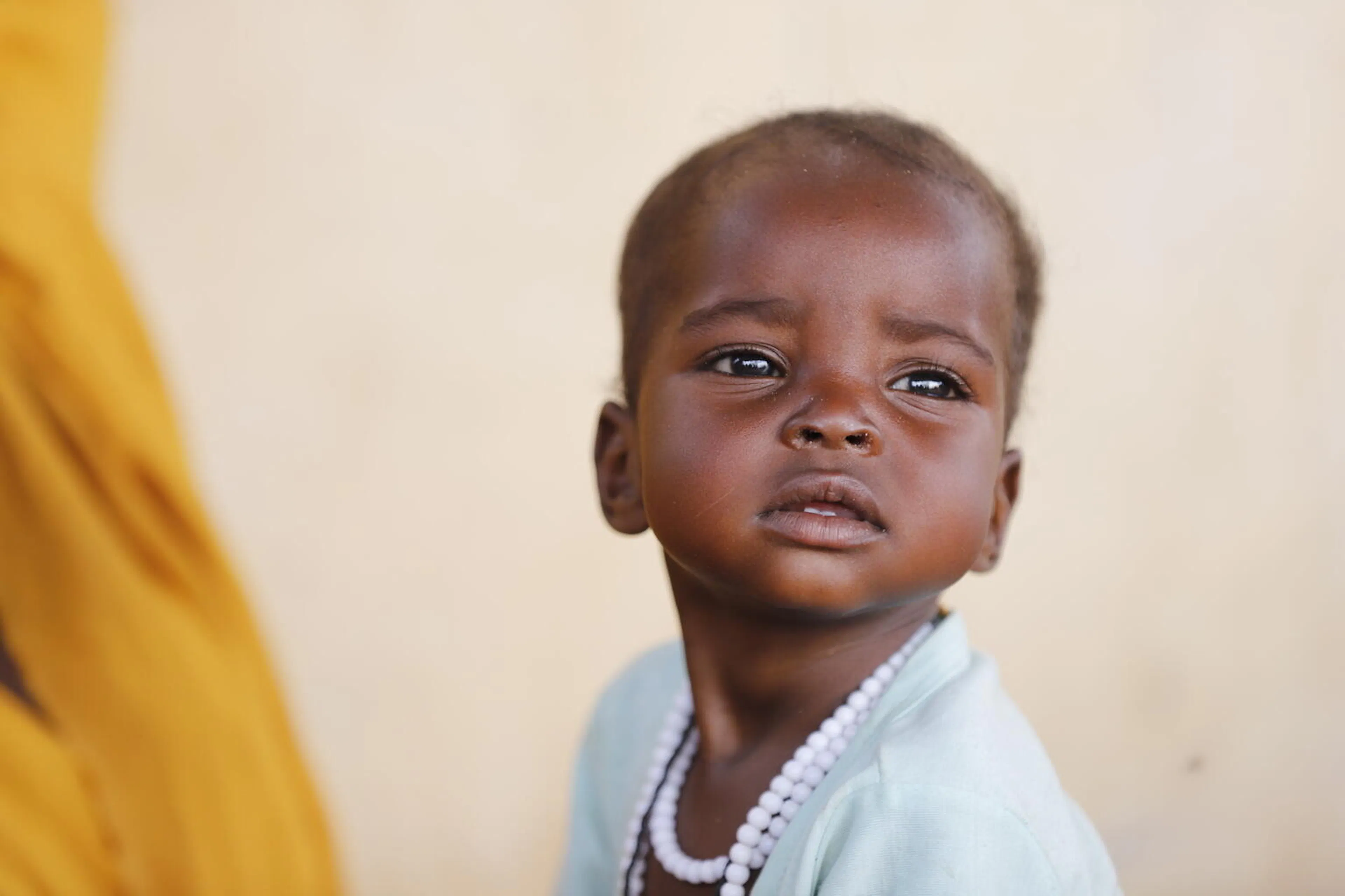 Health workers screen children for malnutrition at a UNICEF-supported Primary Health Clinic in Tawila, North Darfur.