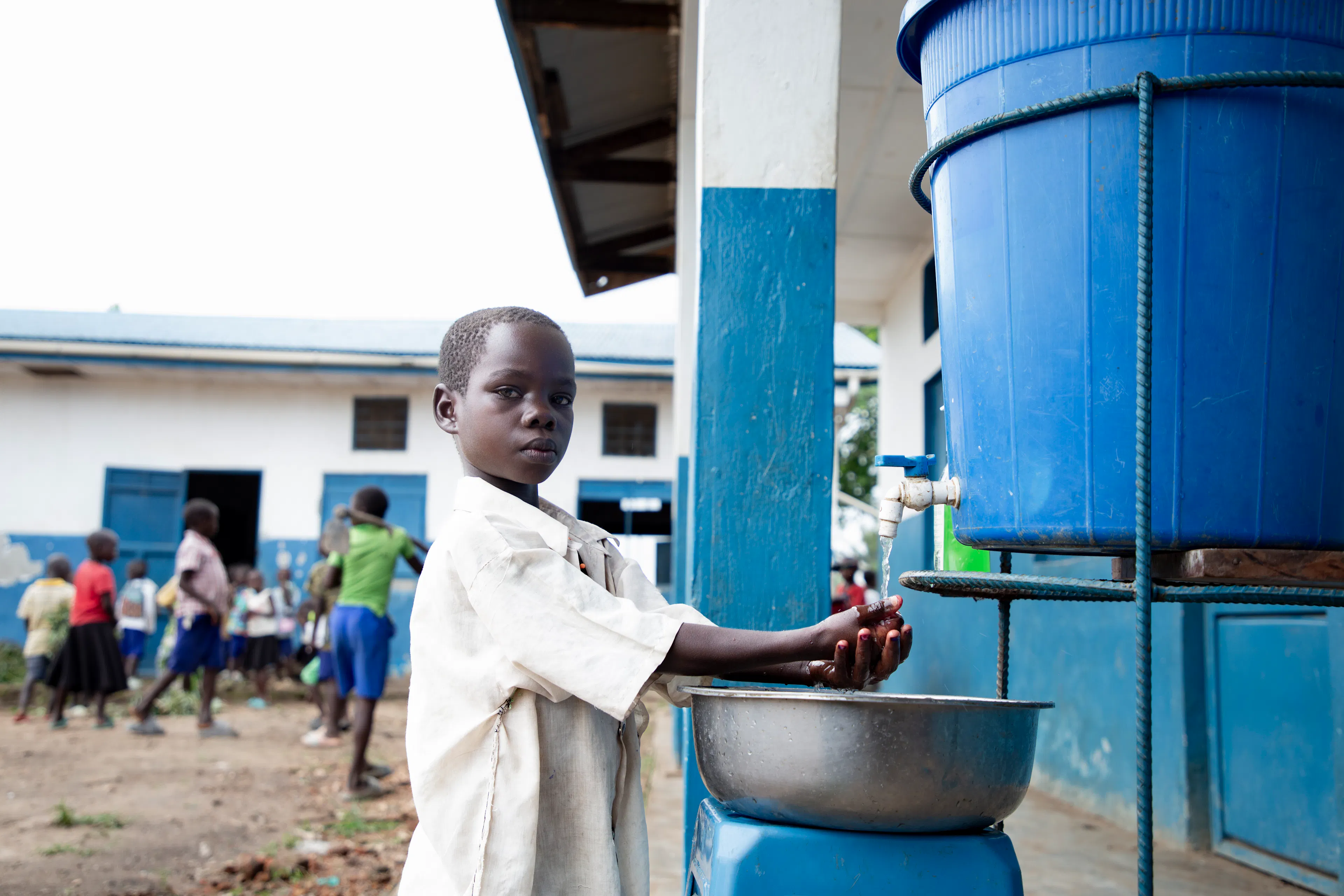 Claudine, 12, washes her hands at the UNICEF-supported Biringi Primary School in Ituri Province, DR Congo, on 16 May 2026.