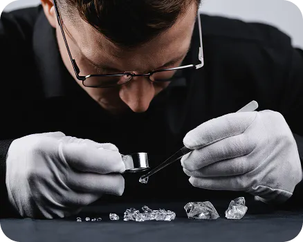 UNI Gemologist performing QC