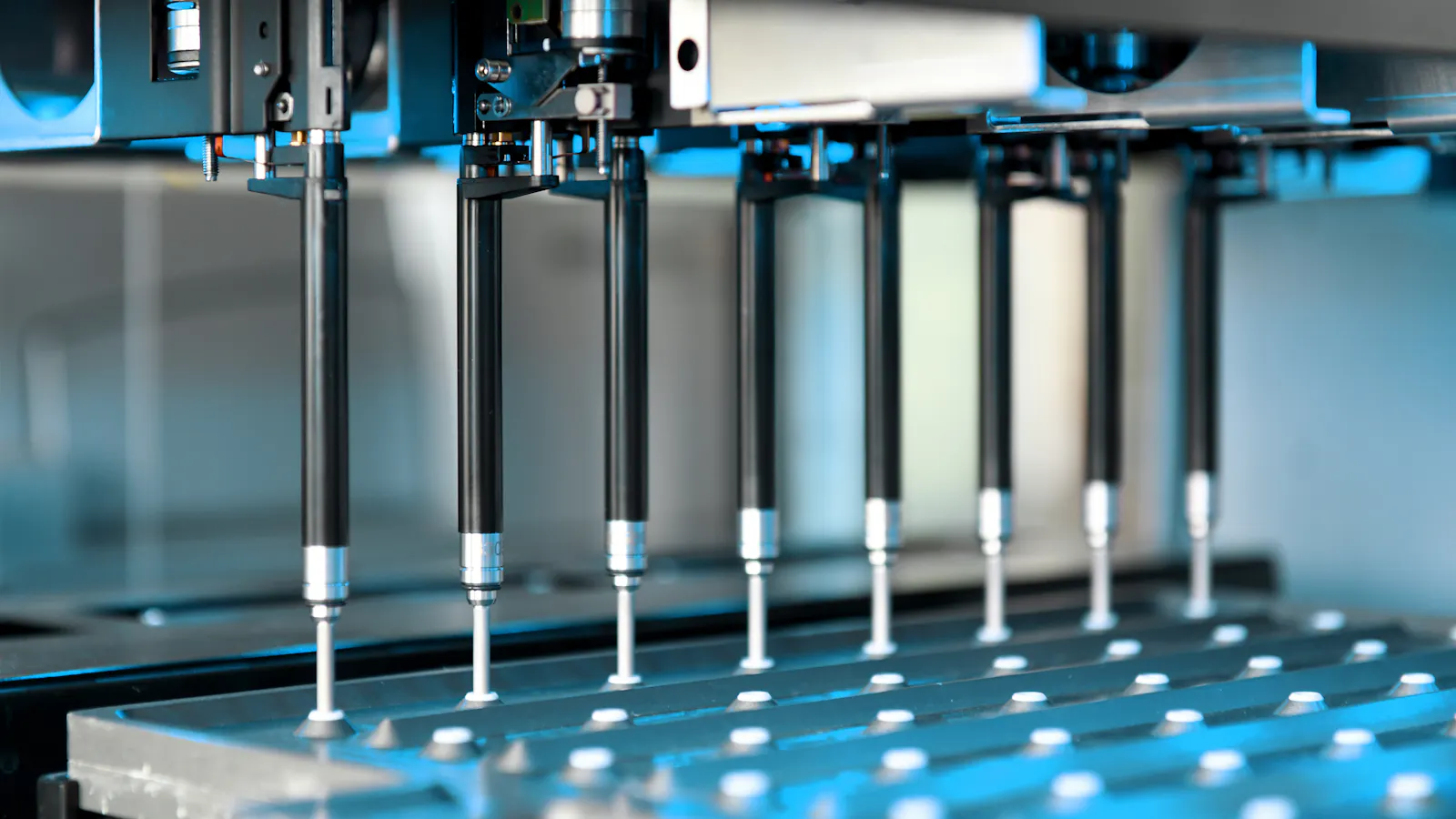 Liquid handling station performs mulit-channel pipetting steps.