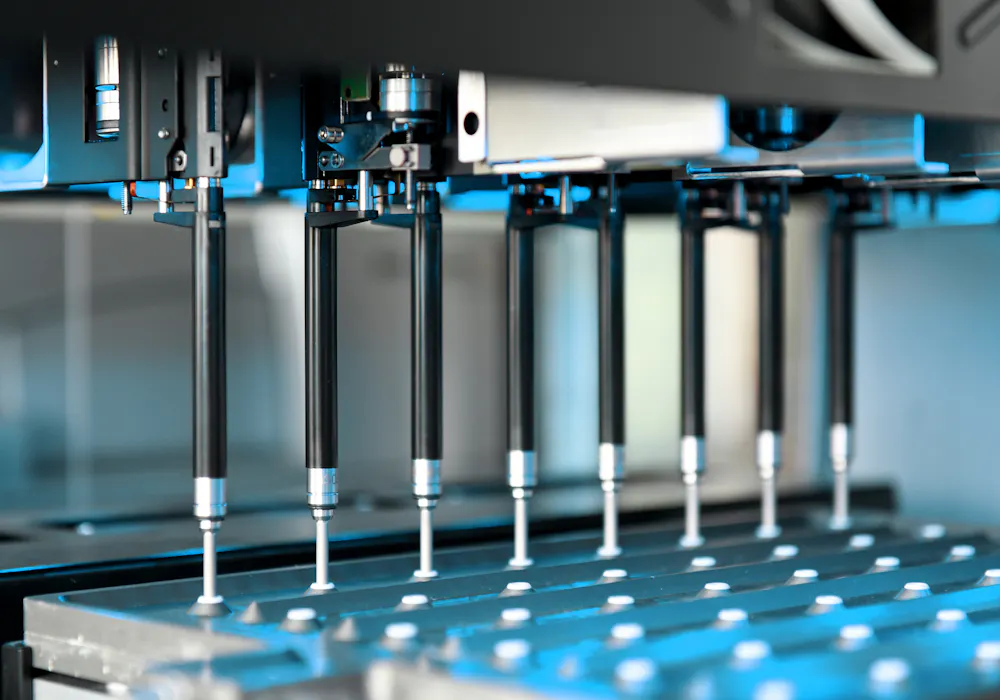 Liquid handling station performs mulit-channel pipetting steps.