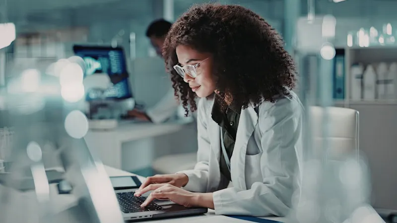 A platform leader working with her laptop