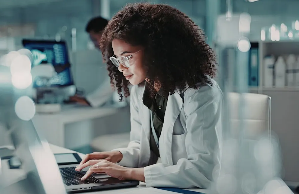 A platform leader working with her laptop