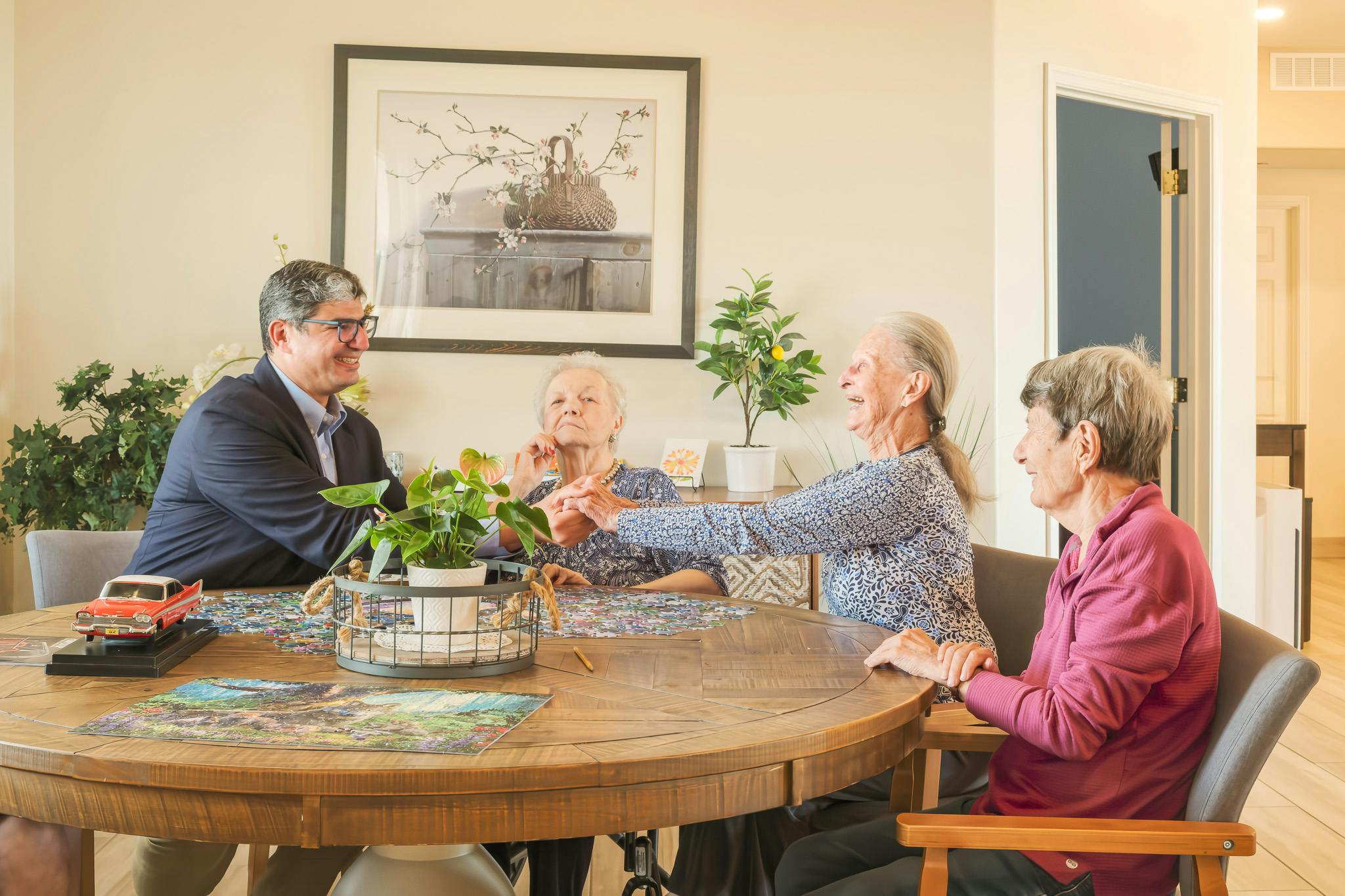 Our founder, Dr. Nassar, with our residents Helen, Margaret, and Dorothy.