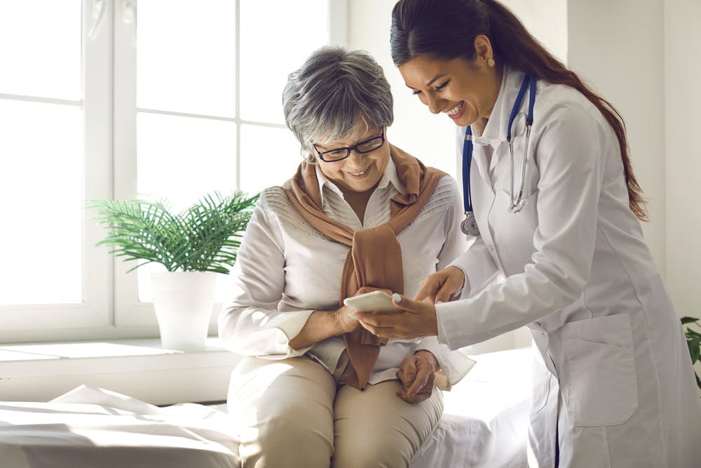 A doctor and a patient sharing a moment