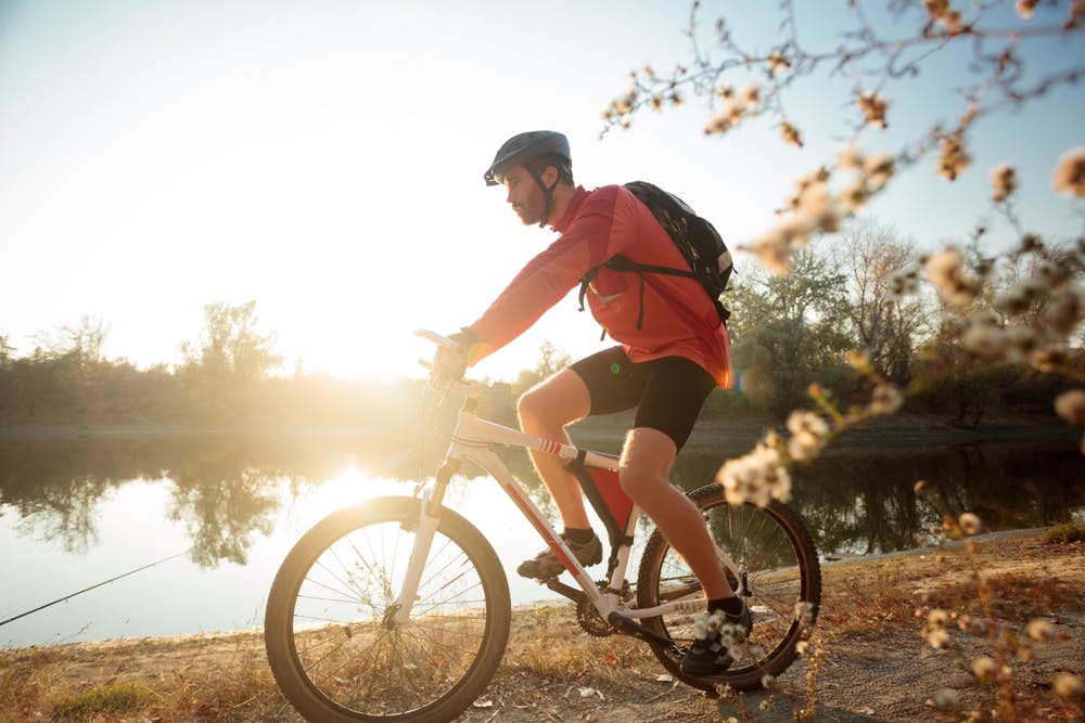 A man biking in the park