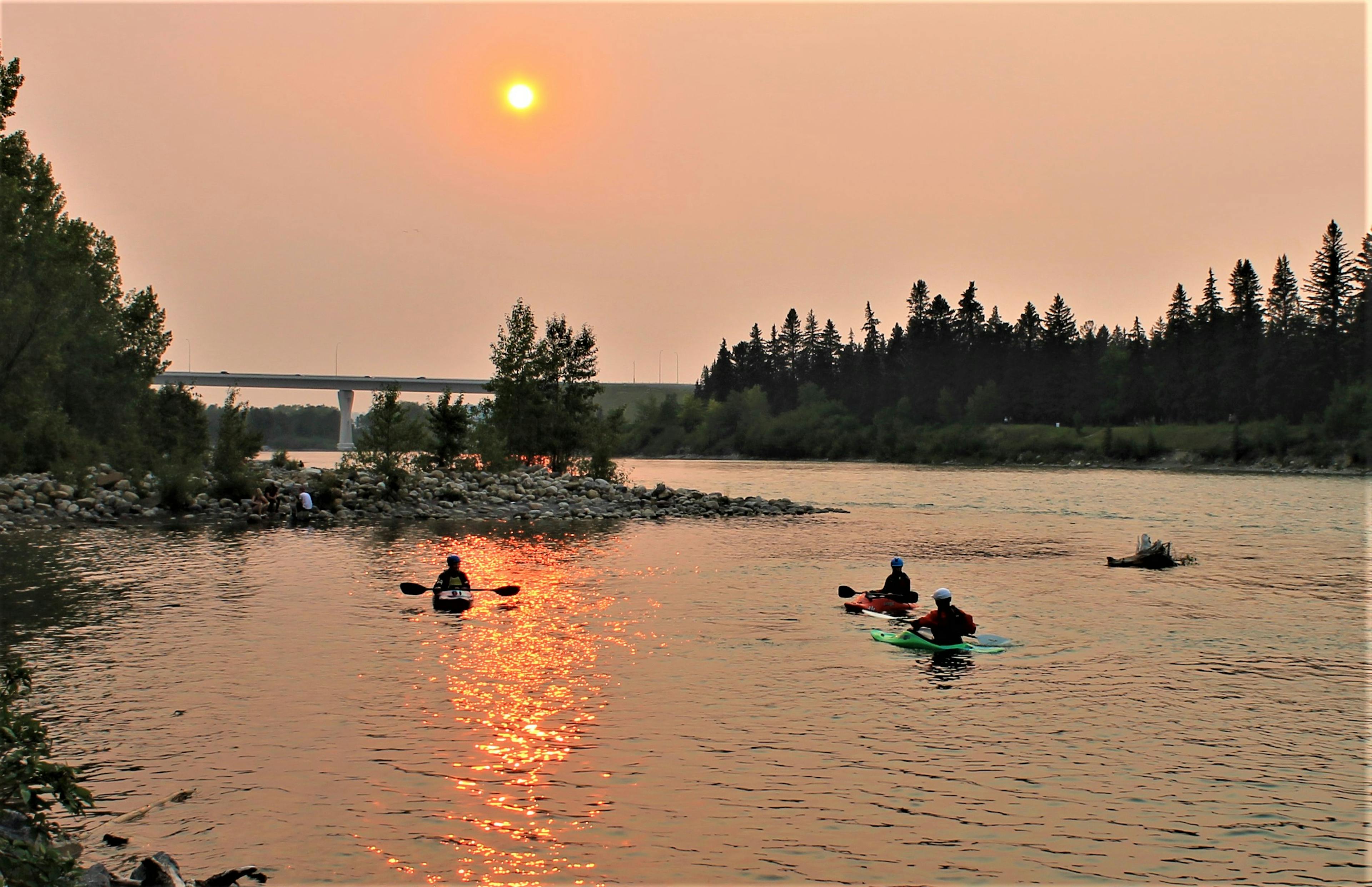 A group Kayaking on the Bow River