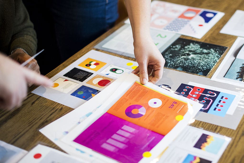 Pictures printed out on a table