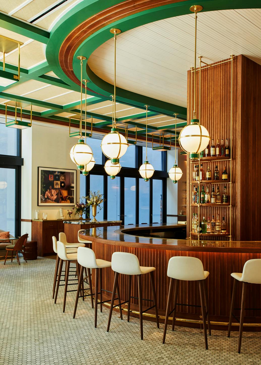 From left: The Flat shown in hewn brass lacquered finish with custom powder coat match Benjamin Moore #2036-10 Cat's Eye Green accents, modified. Hull shown in hewn brass lacquered finish and Benjamin Moore #2036-10 Cat's Eye Green custom powder coat match accents and opal glass. Interiors by Ken Fulk as seen in Legacy Records, New York, NY.