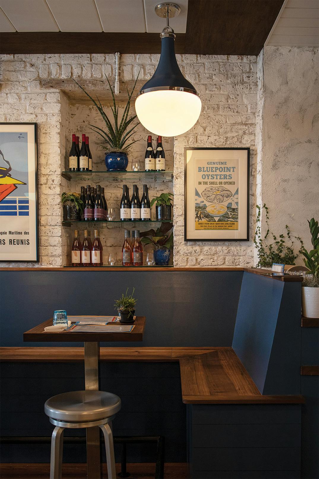 A corner pocket fronts a painstakingly preserved interior brick wall at 167 Raw in Charleston. 
