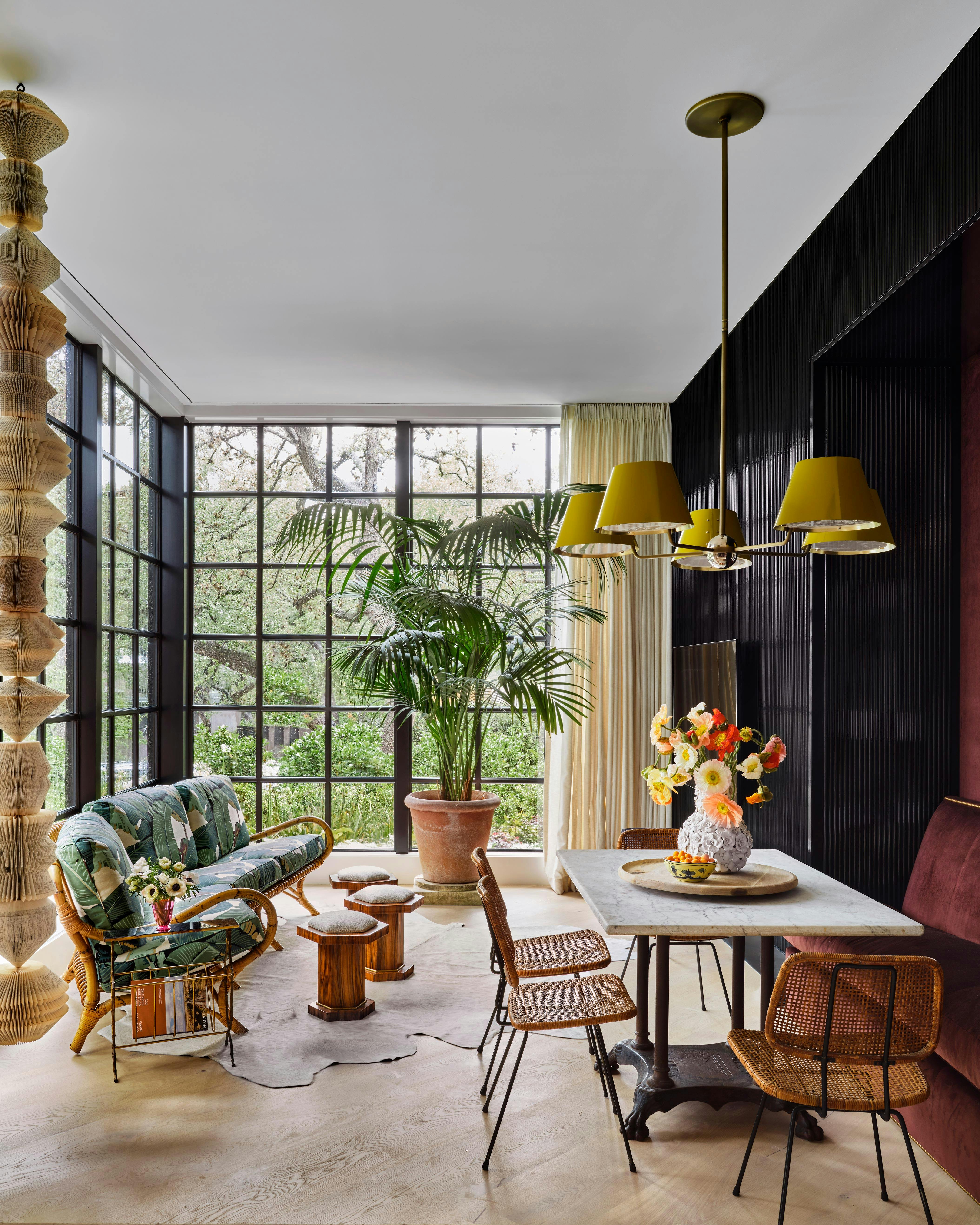 Chiltern Round shown in antique brass finish with heirloom accents. Shades shown in RAL #1027 Curry powder coat finish with hewn brass lacquered interior. Interiors by Fern Santini. Photography by Douglas Friedman.