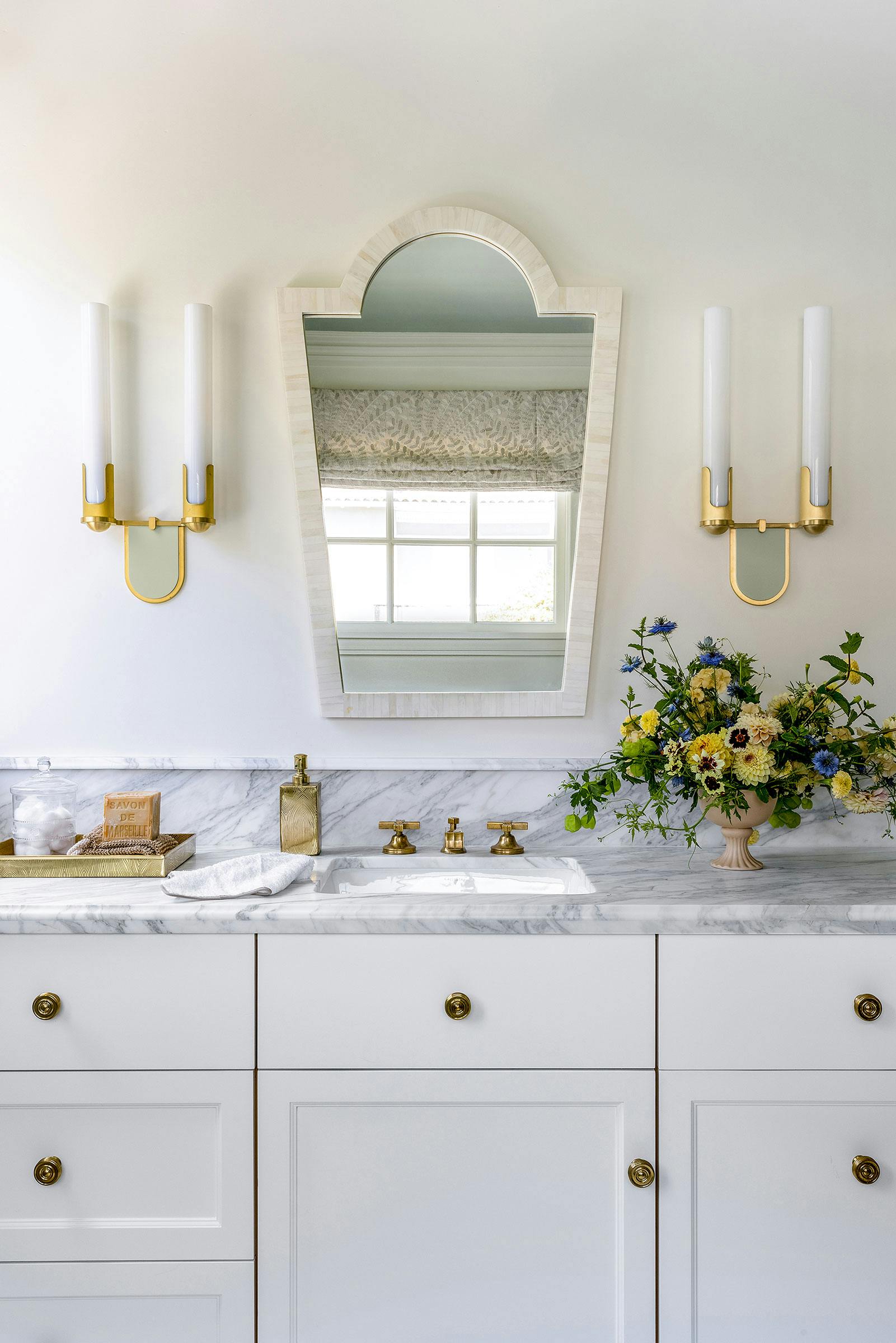 Elystan Double shown in hewn brass lacquered finish with UECo. Signature Color Lamb's Ear Green accent. Interiors by Caitlin Jones. Photography by Vivian Johnson.
