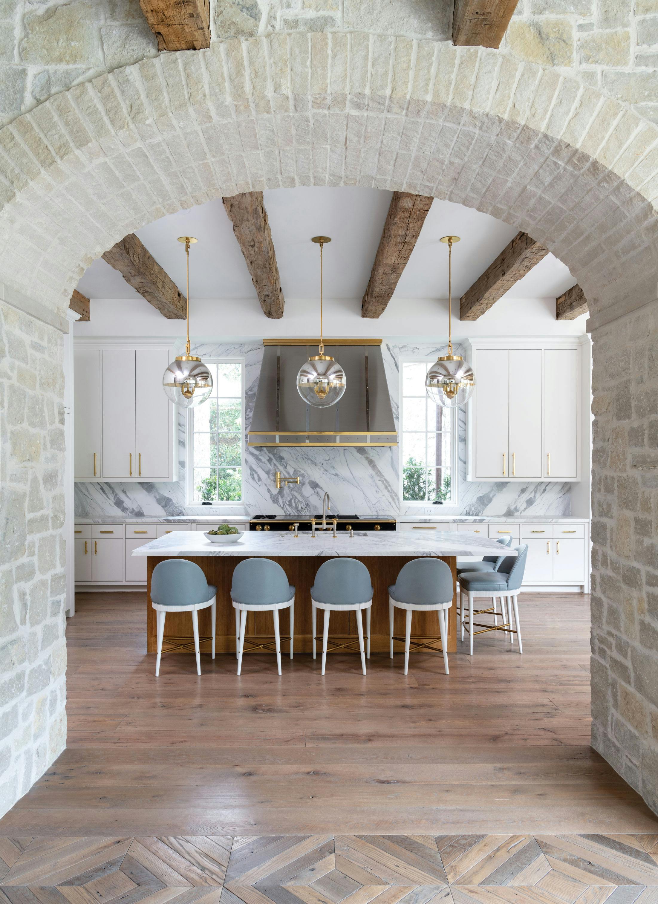 Globus size regular shown in hewn brass lacquered finish with hewn brass lacquered secondary finish, hewn brass lacquered accents and partially silvered glass. Interiors by Munger Interiors. Architecture by Robert Dame Designs. Build by Allan Edwards Builder. Photography by Michael Hunter.