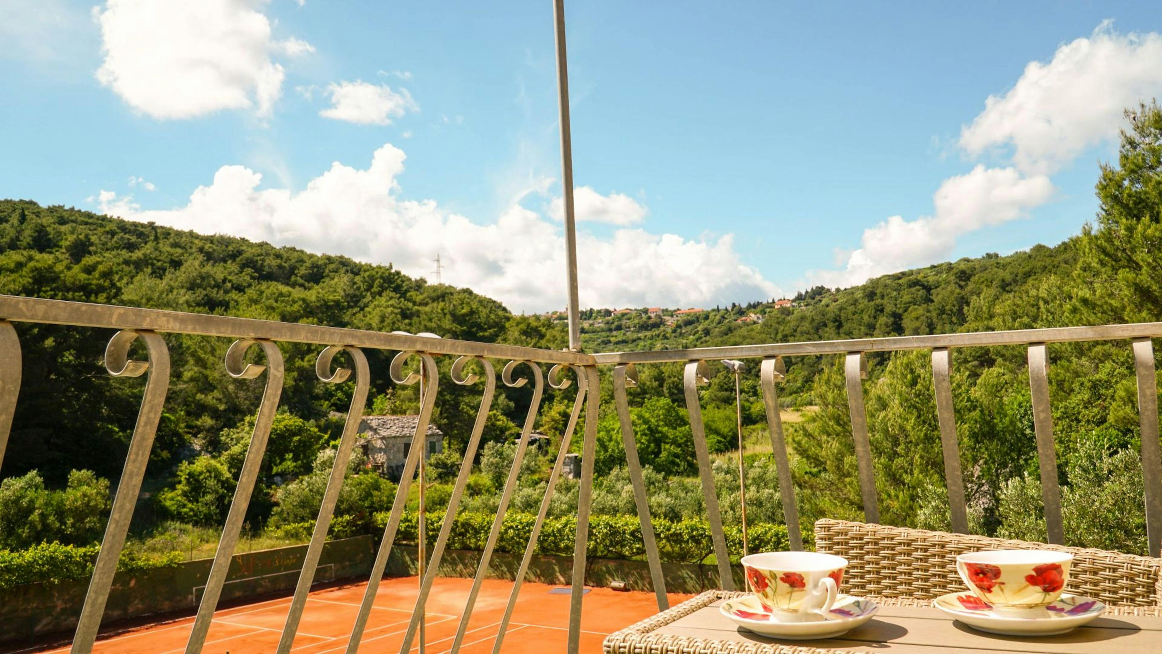 Balcony and tennis court