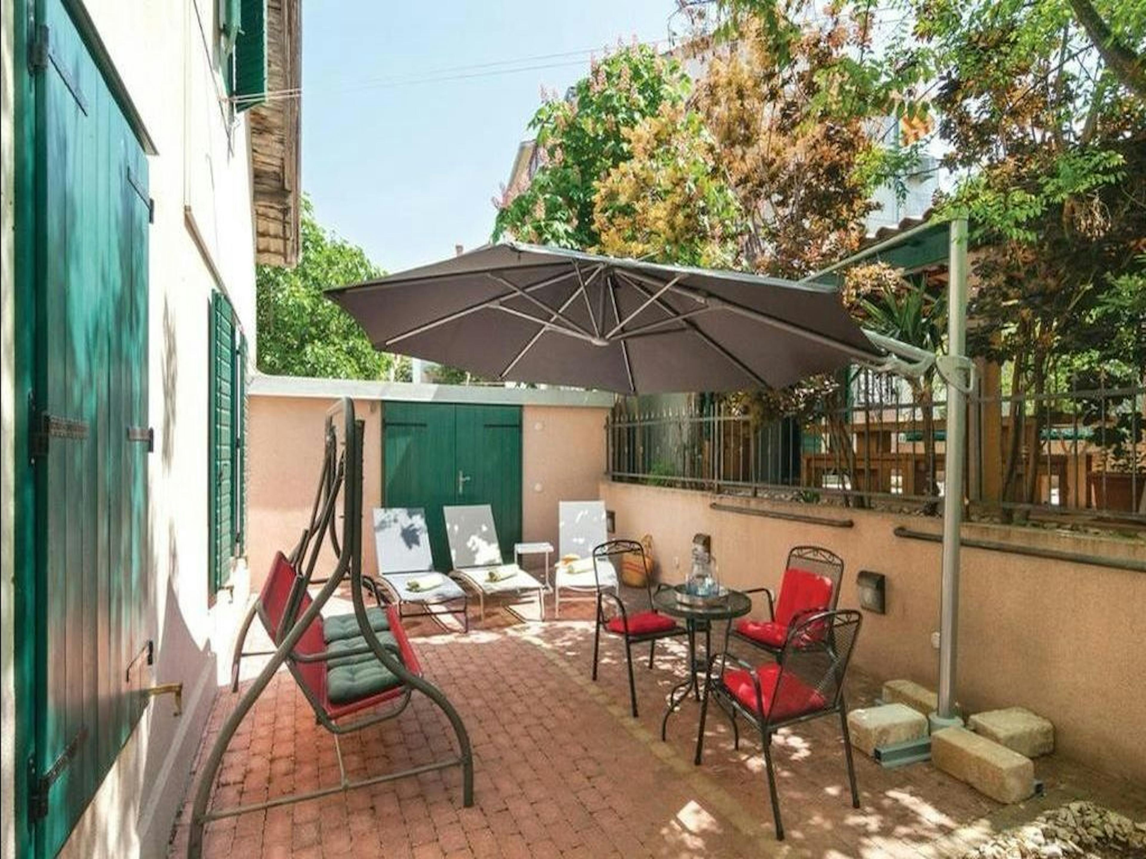 Private patio with outdoor furniture