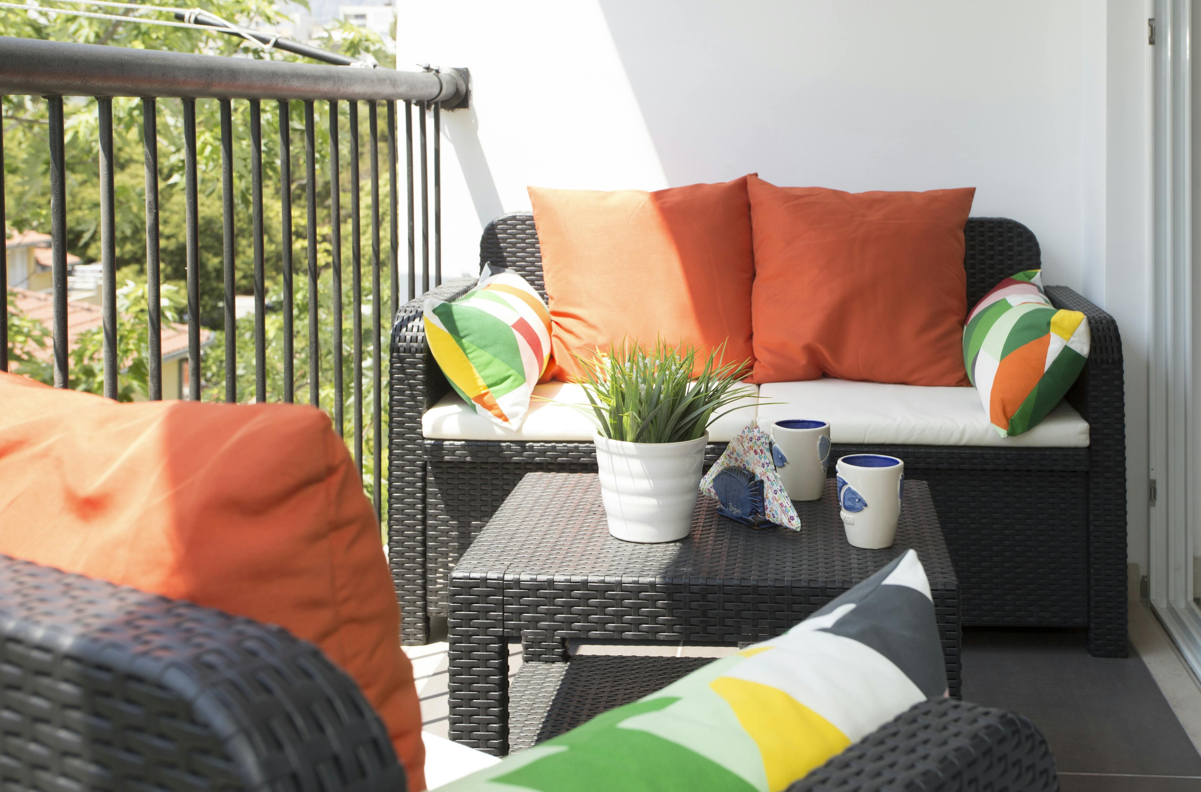 Balcony with an outdoor furniture - perfect spot for morning coffee or evening drink 