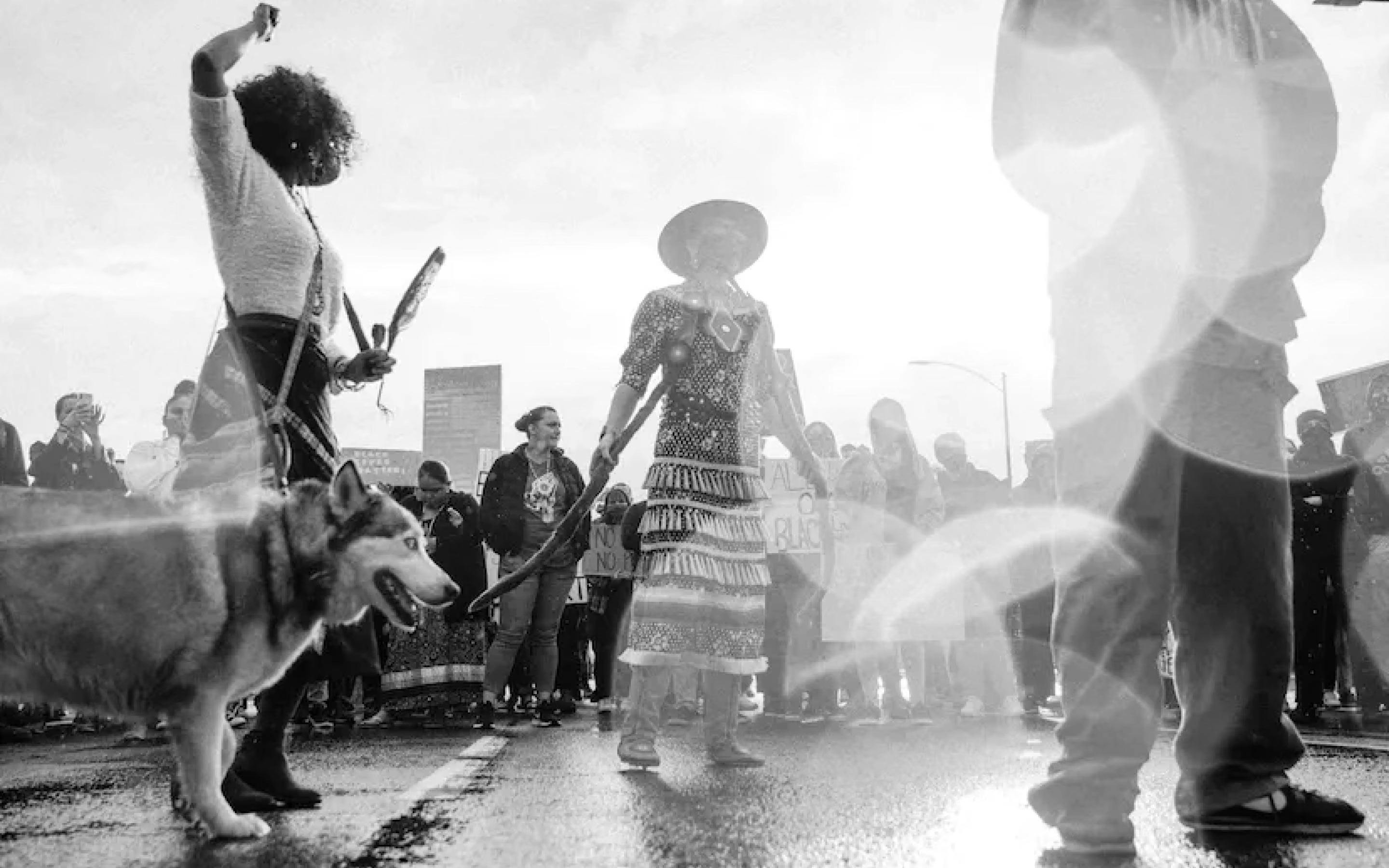 A black & white photo of a protest