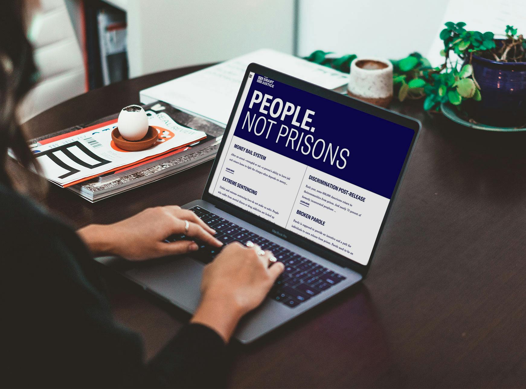 People not prisons on a laptop