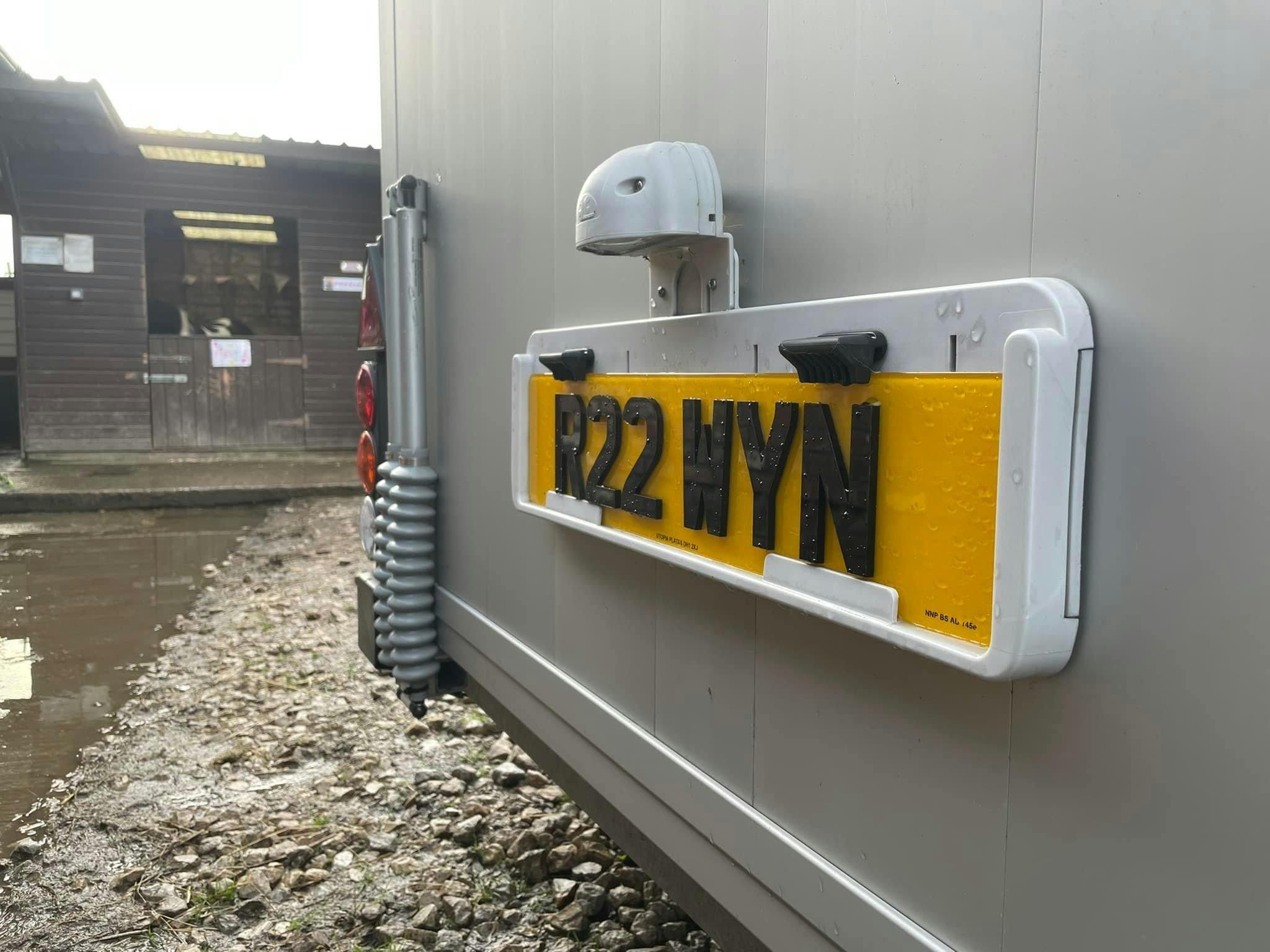 A horse box with a 4D 5mm rear number plate