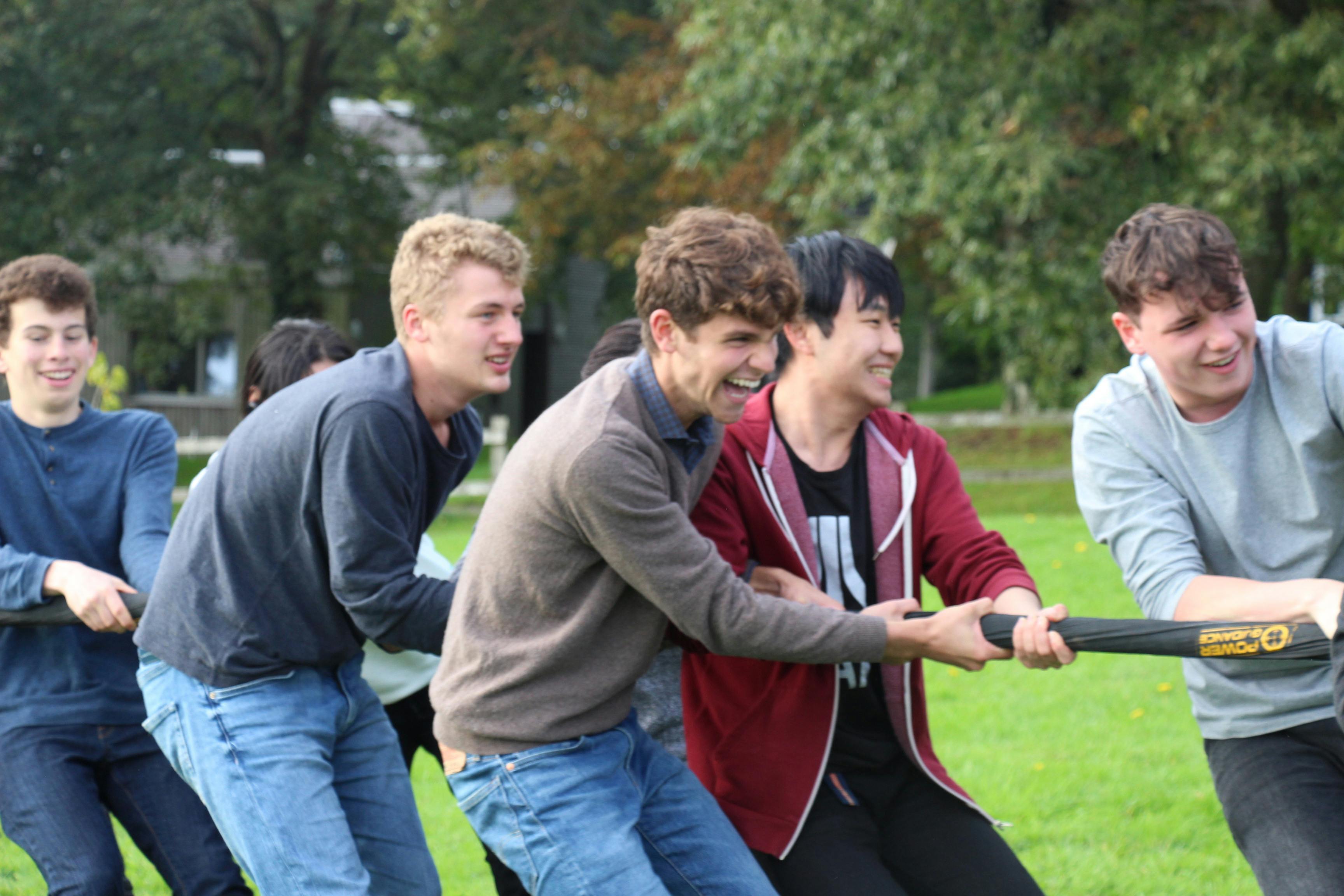 students playing tug of war
