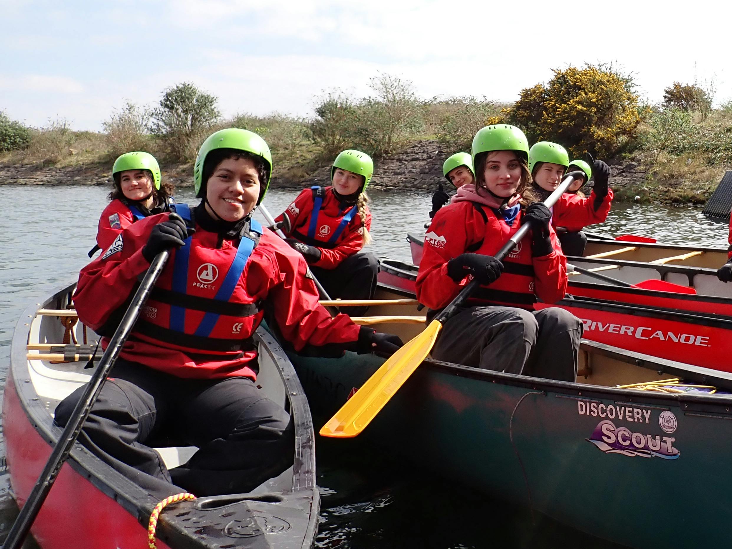 students canoeing