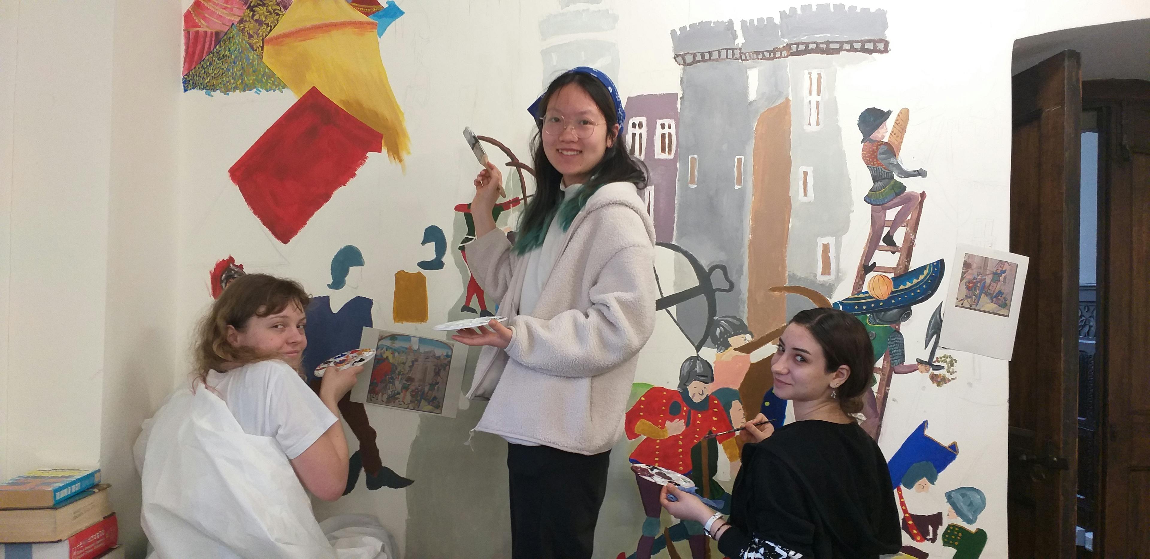 students painting