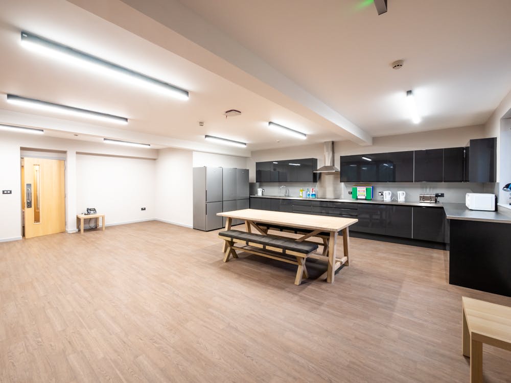 uwc atlantic college dorm kitchen and living area