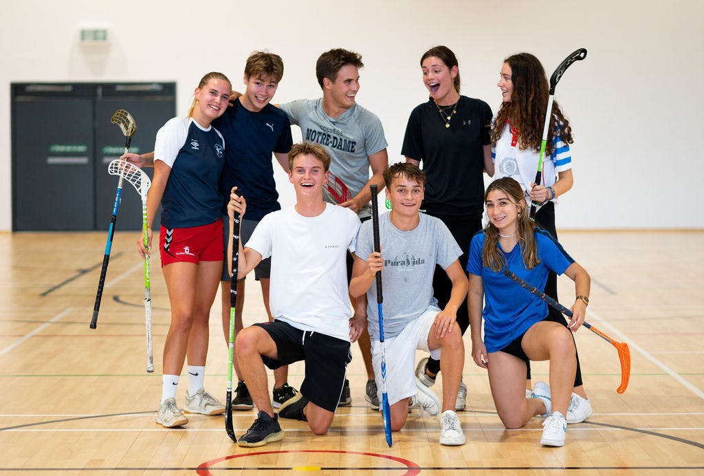 students playing hockey