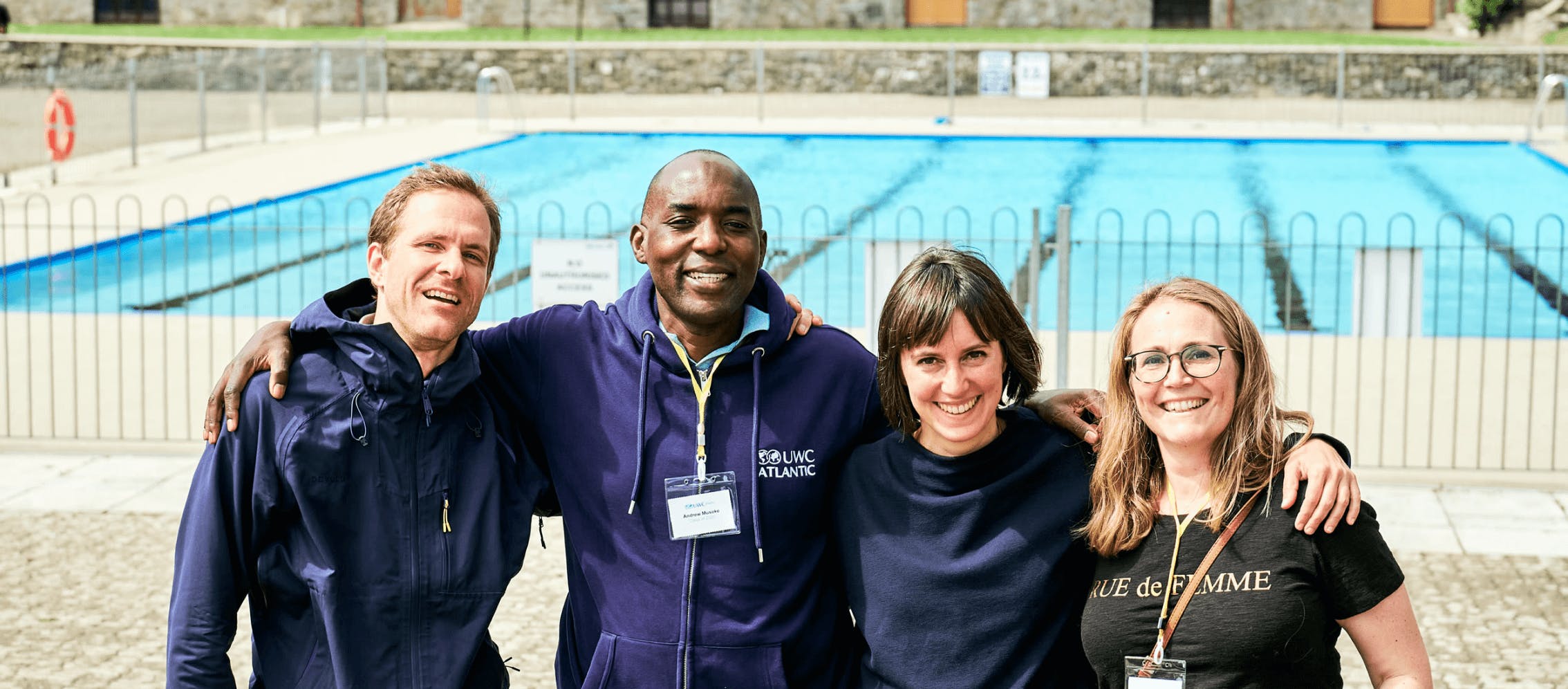 alumni outside the uwc atlantic swimming pool