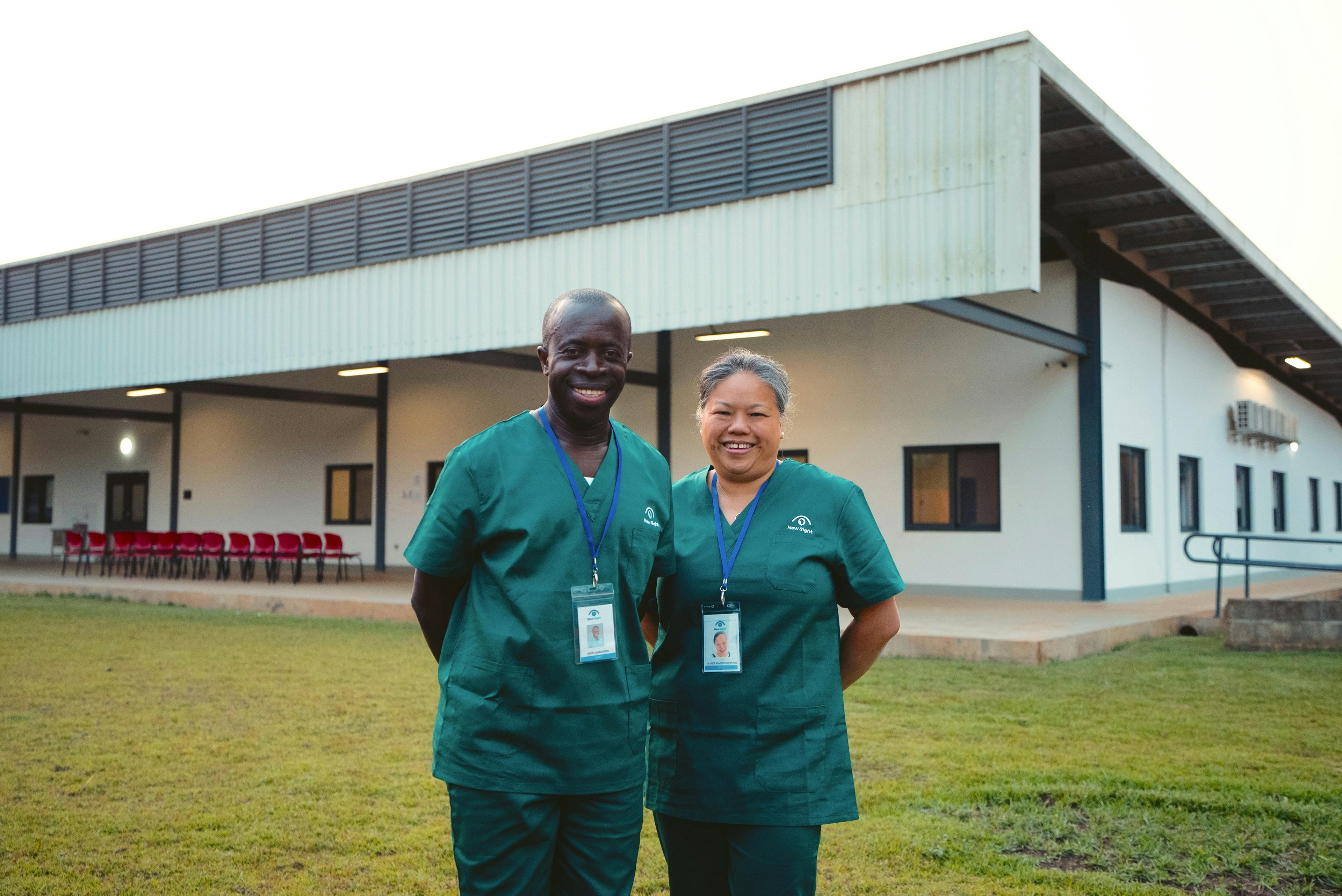 Joyce Samoutou-Wong (Ac'95) and Henri Samoutou outside their new eye clinic in Quesso, the Republic of Congothey founded
