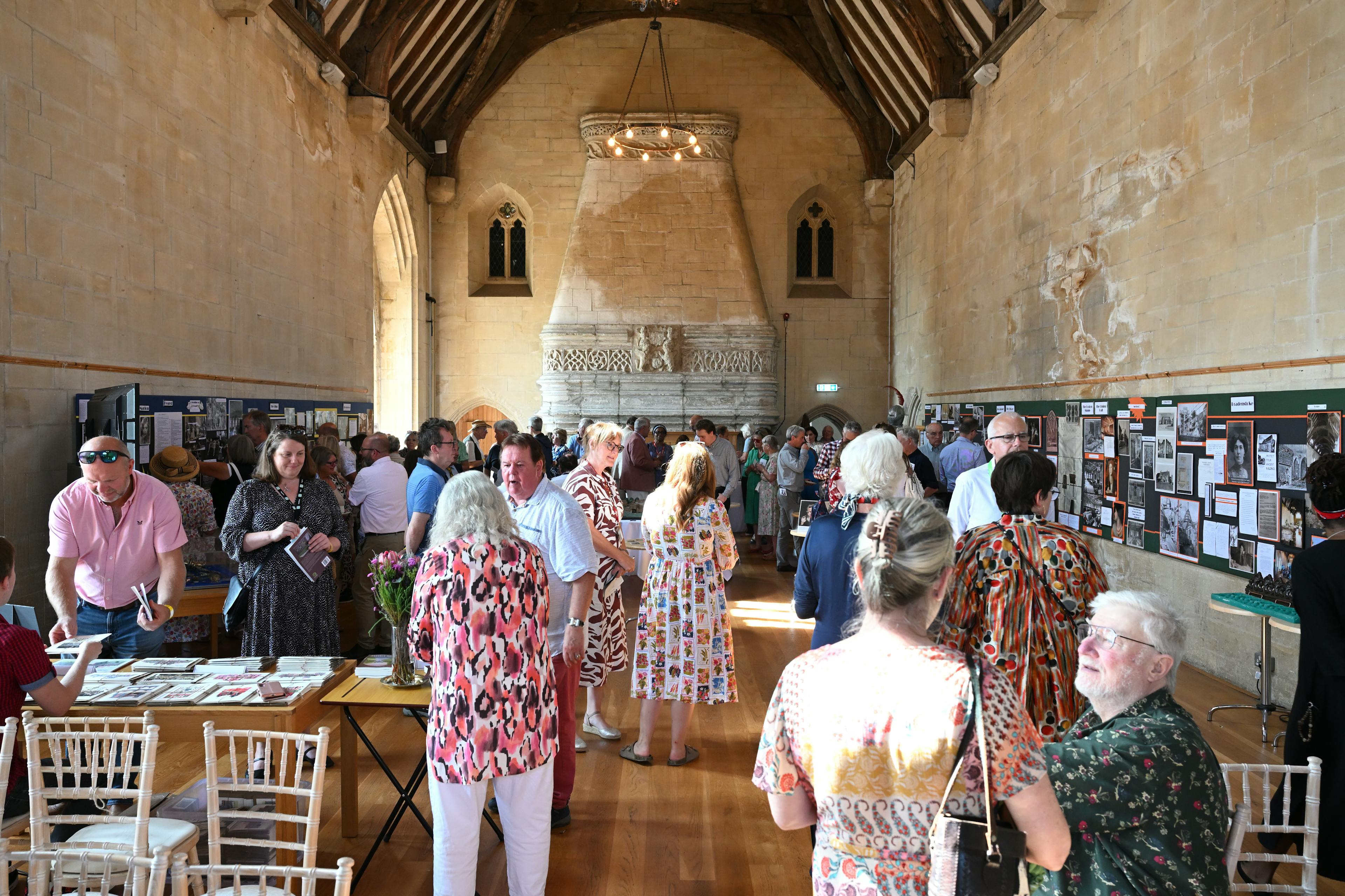 Attendees from the community enjoying the exhibition