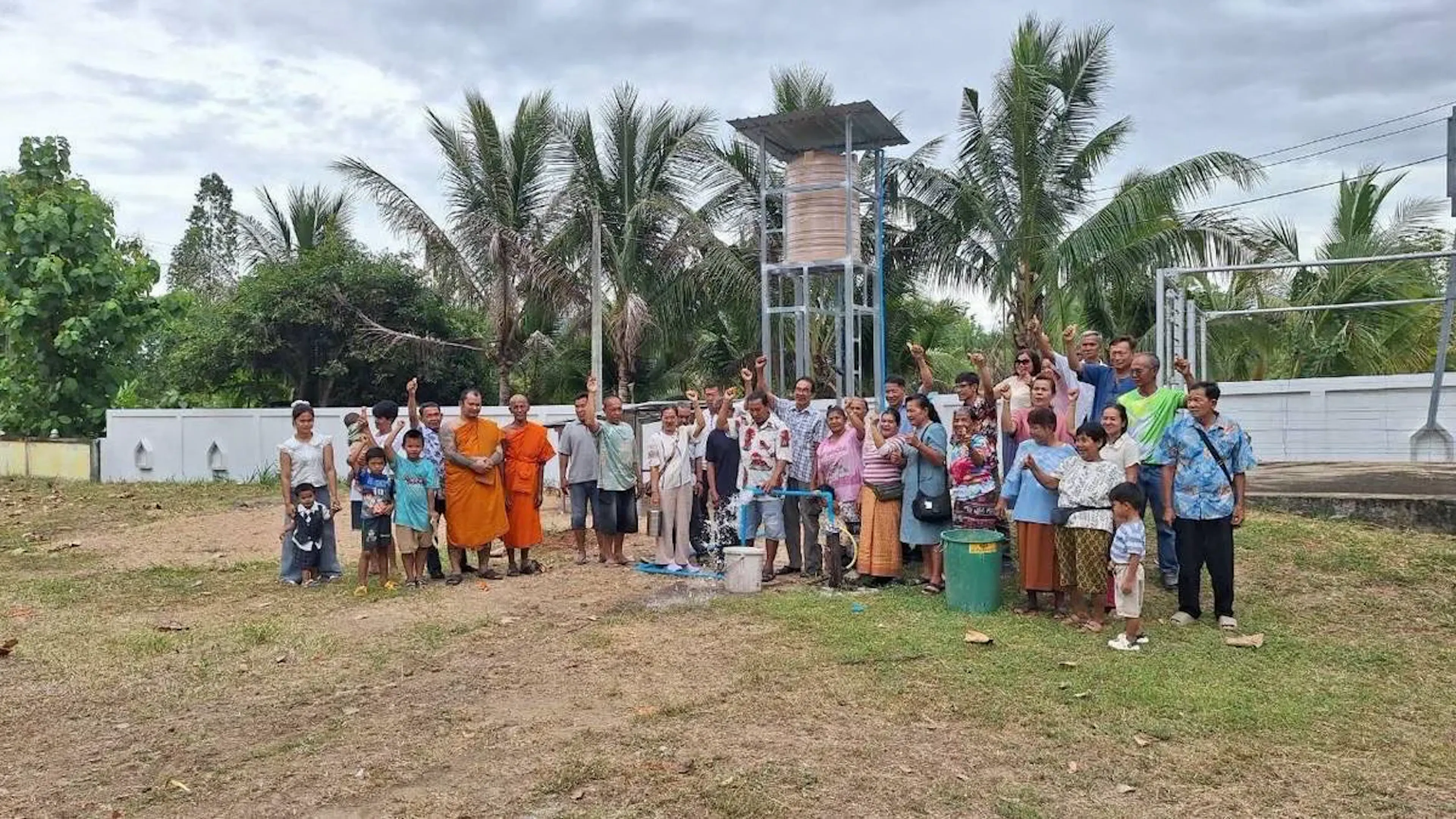 residents at the Sam Yaek Phatthana Temple in Nepal take ownership of the renewable energy water system supported by UWC Atlantic student Roon