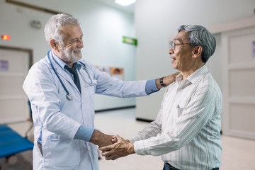Man thanking his doctor for the colonoscopy