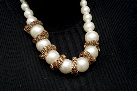 Versace necklace of huge pearl beads and gold mesh.