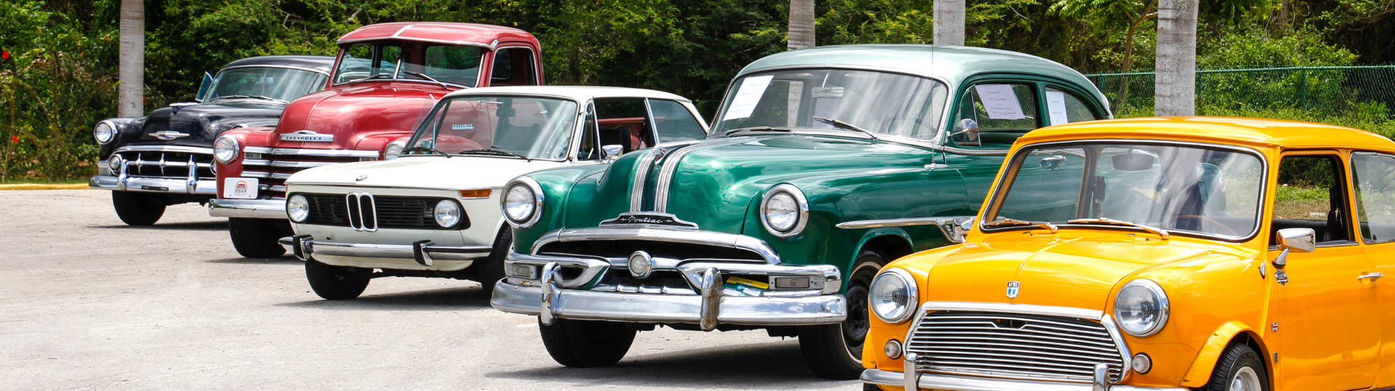 row of parked classic cars