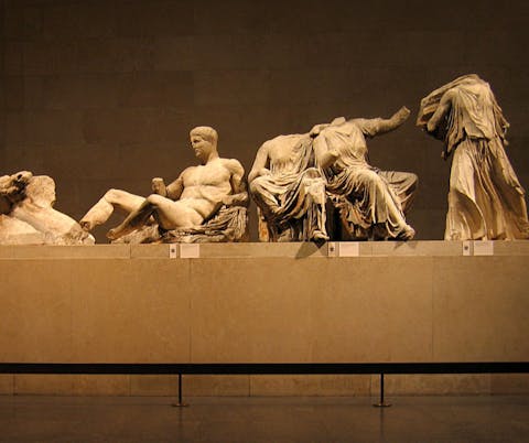The left hand group of surviving figures from the East Pediment of the Parthenon, exhibited as part of the Elgin Marbles in the British Museum
