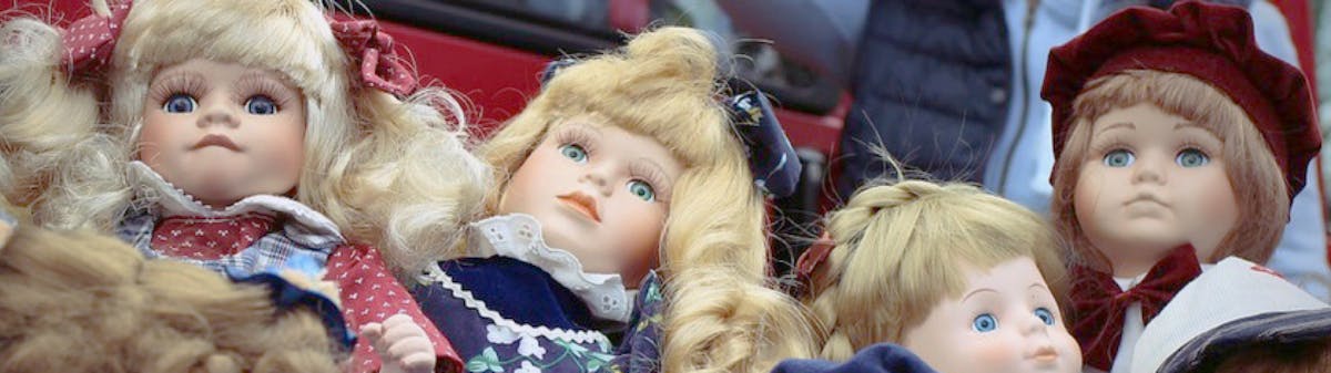 four vintage dolls