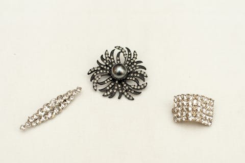 Crystal and rhinestones brooches 